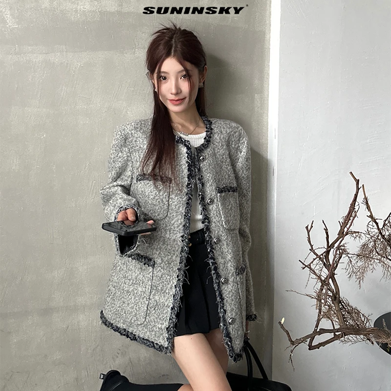 SUNINSKY静奢秋冬小香风流苏毛边拼接外套K31007