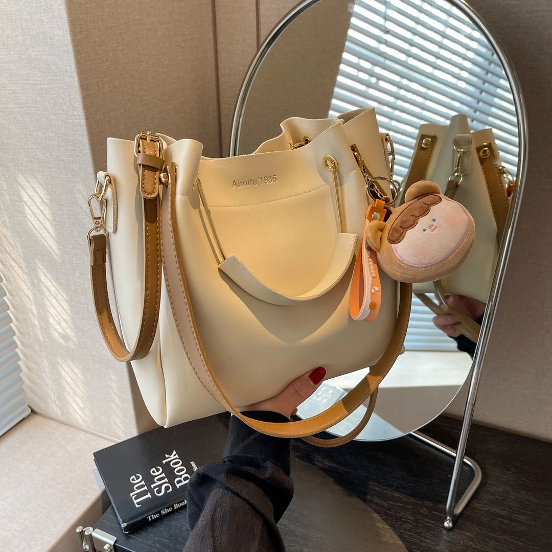 COOLE洋气百搭小众2025新款质感休闲潮流大容量通勤单肩托特包