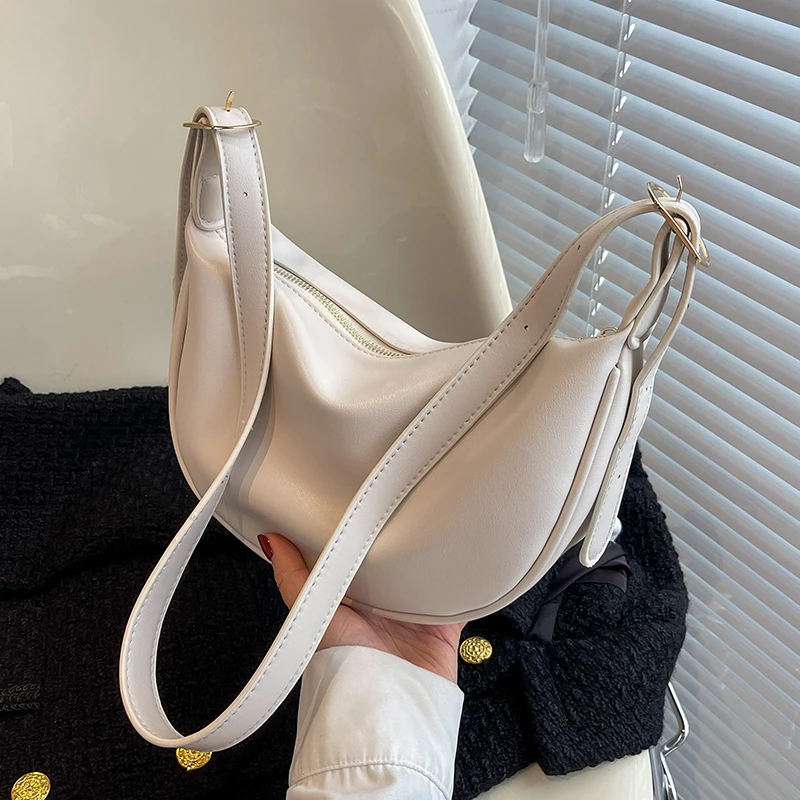 COOLE2025新款流行时尚百搭纯色质感设计洋气通勤单肩斜挎饺子包