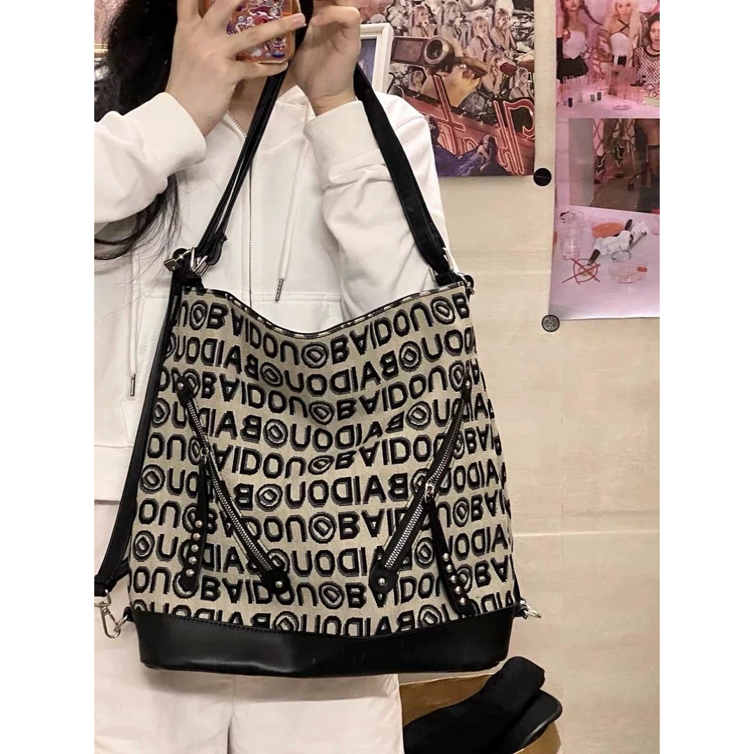 大容量通勤双肩包女2024新款设计感小众百搭托特包上课单肩包包女