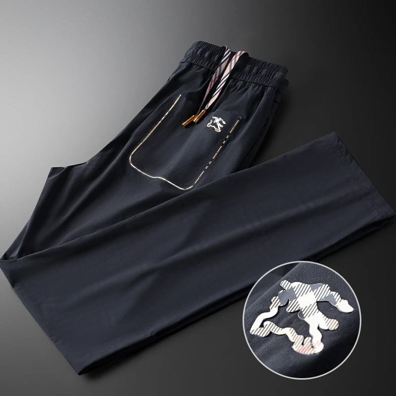 夏季轻薄款冰丝速干暗纹格子裤男修身小脚高端欧货休闲运动裤男士