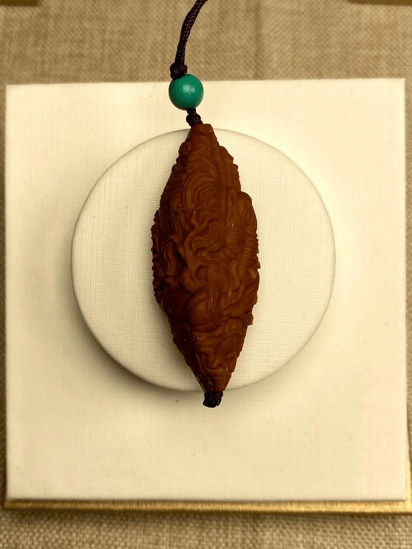 瑾雅，风景观音单籽橄榄核雕