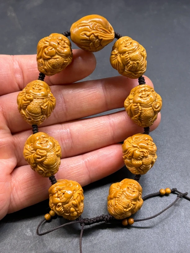 橄榄核雕刻八大财神手串手链文玩