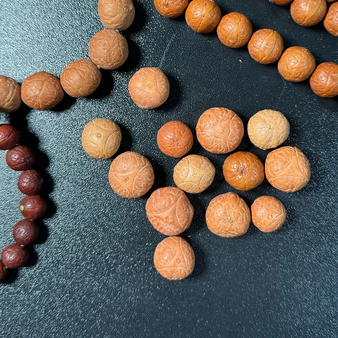 尼泊尔♠龙眼♥麒麟眼♦菩提♣㊣精品原籽通孔三通念珠文玩