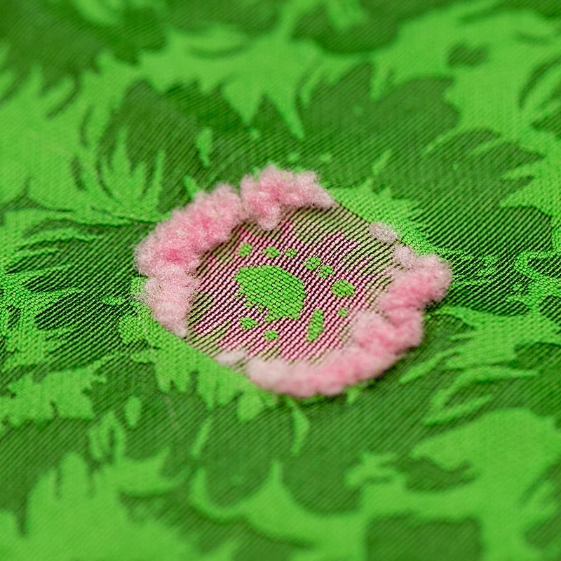 绿色植物提花梭织面料女装服饰设计连衣裙大摆裙布料撞色肌理感