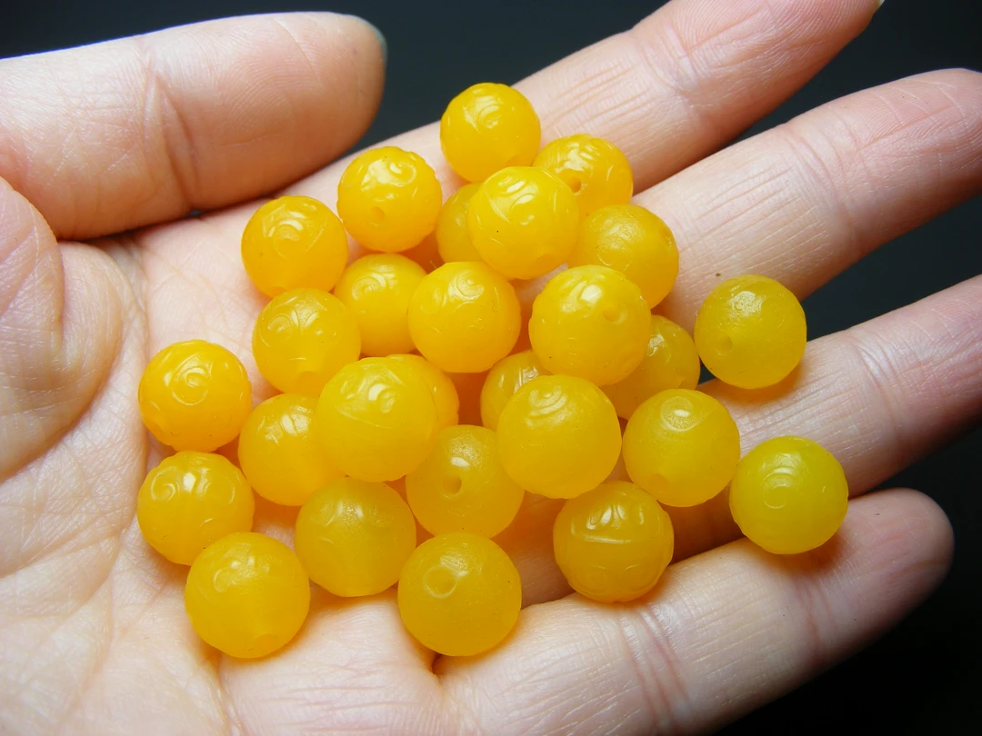 几十年的柠檬黄缠丝玛瑙卷云纹磨砂底工艺中号圆珠（一单发一颗