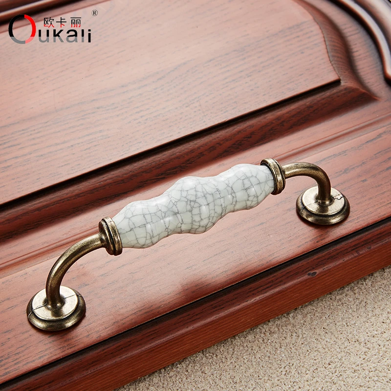 欧卡丽 葫芦陶瓷锌合金黑白把手 橱柜抽屉家装板式家具五金拉手