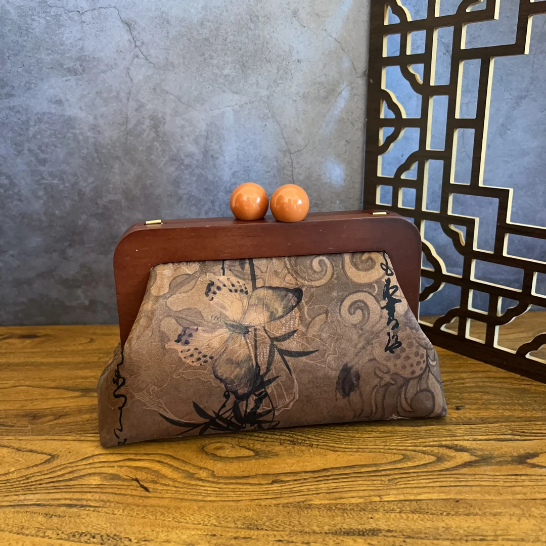 新中式香云纱蚕丝口金包复古手拿包书法斜挎包古典气质真丝包包