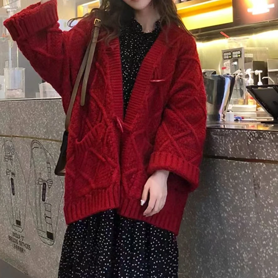 时尚新款牛角毛衣开衫