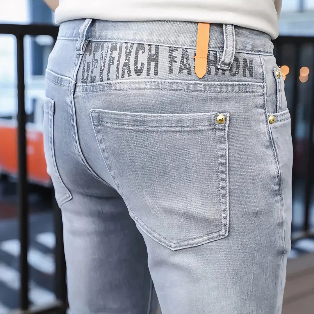 【1轻奢牛仔高端帅气欧货时尚潮流修身弹力百搭水洗灰色牛仔裤男