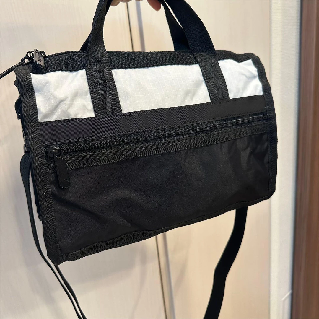 【工厂直销】乐乐家黑白配超轻手拎斜跨包