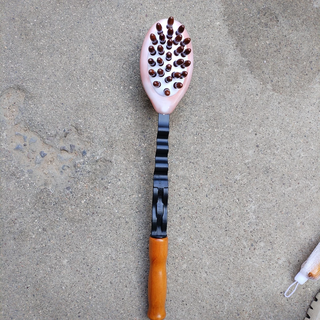 塑料按摩器敲背锤弹簧敲背锤