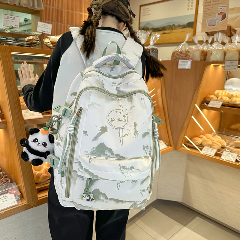 日系ins原创小众涂鸦书包女初中生高中生减负背包大学生旅行背包