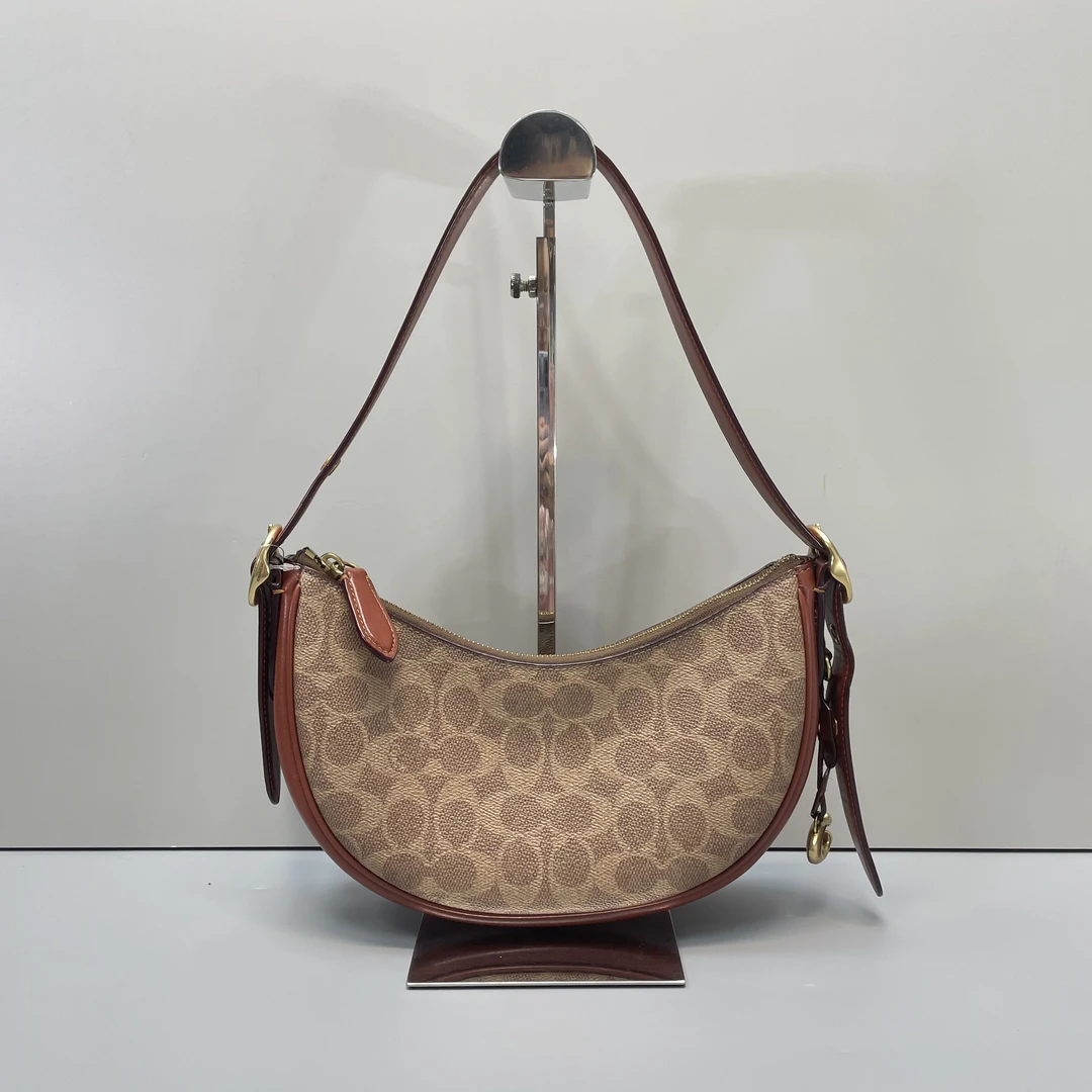 95新 COACH/蔻驰 luna红棕老花月牙腋下包27x13x7cmL100514