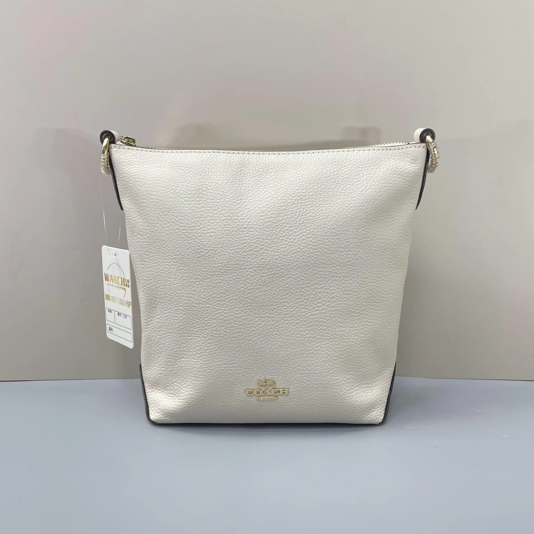 95新 COACH/蔻驰 duffle23白色斜挎流浪水桶包23x24x10cmL082308