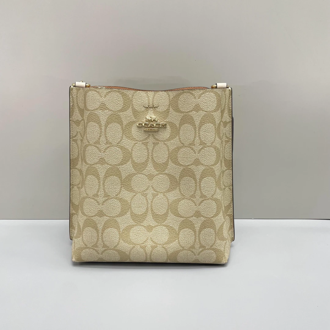 95新 COACH/蔻驰 mollie白拼老花小号水桶包20X22X10cmL070212