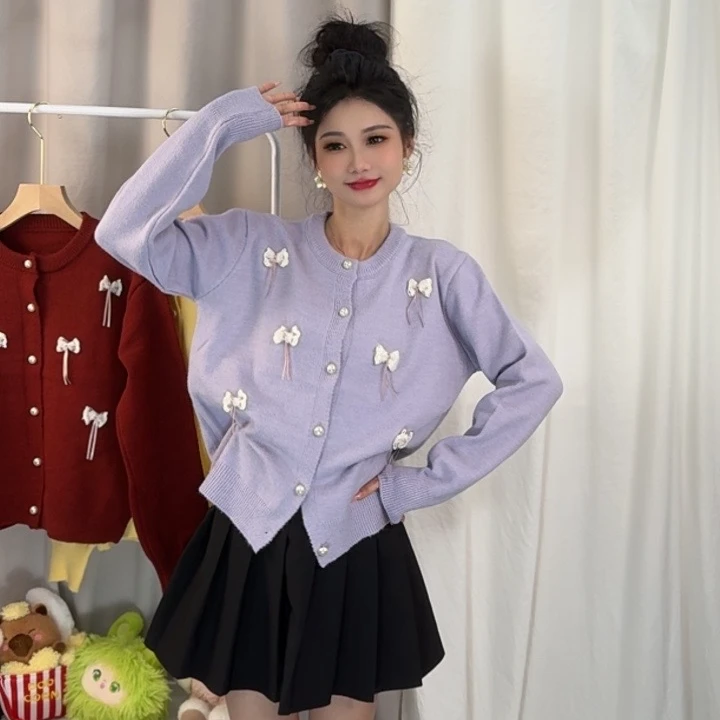 蝴蝶结单排扣圆领毛衣秋冬季韩版复古减龄小众甜美针织开衫网红款