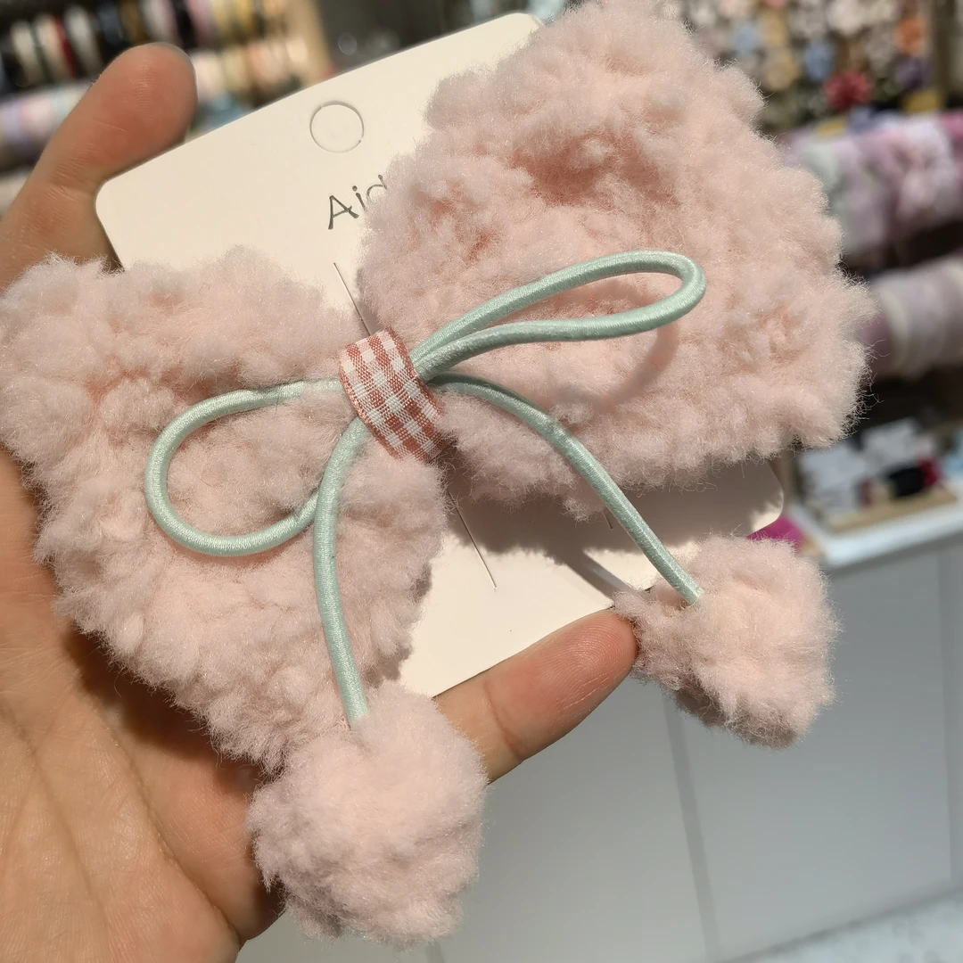 A361(凑满9.9包邮)粉色蝴蝶结毛球边夹