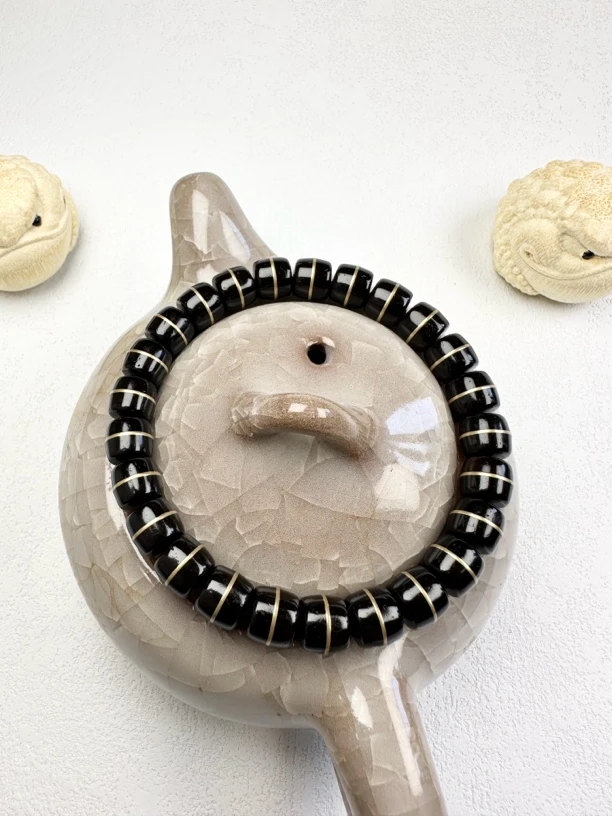 精品铜镶嵌汉堡椰蒂菩提手串，尺寸9x8mm，精选黄铜镶嵌孔道，文玩