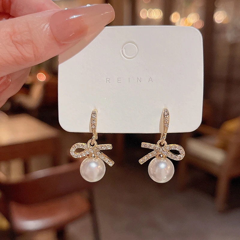 铜合金耳饰 超闪蝴蝶结耳环女ins潮轻奢小众春日新款仿珍珠耳饰