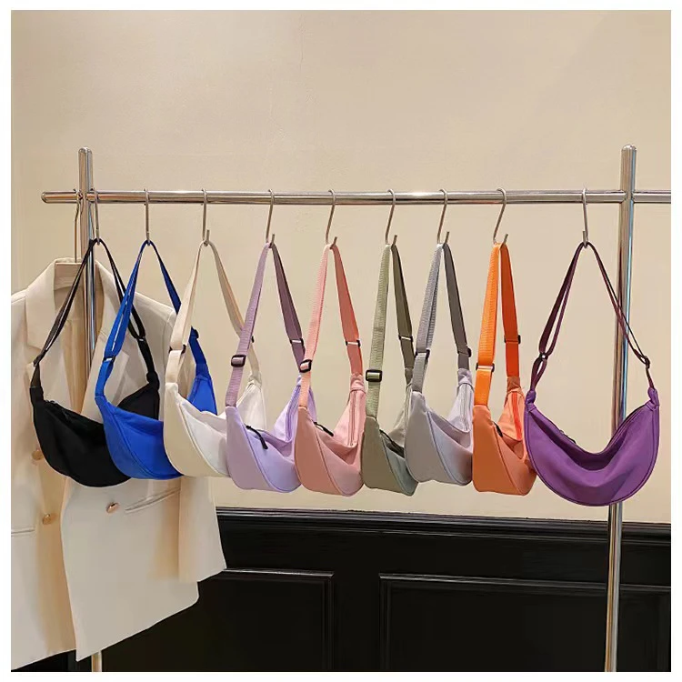 【搭配率满分】2024新款女士饺子包潮流出行收纳袋