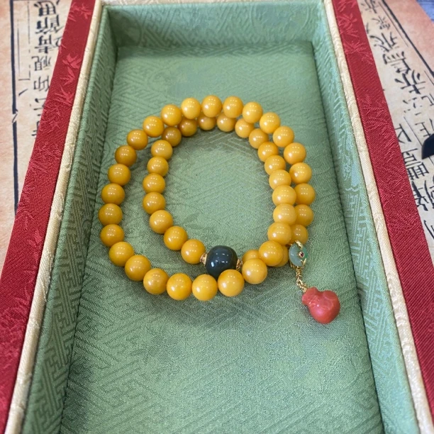 蜜蜡7mm双圈钱袋款手串（多样性发货）