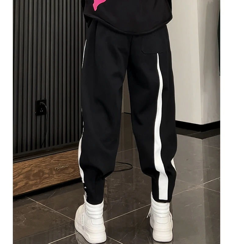 原创潮牌秋冬哈伦裤男宽松排扣不对称设计时尚束脚裤加厚休闲裤