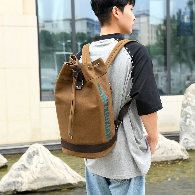 休闲户外双肩背包2023新款时尚简约背包复古个性旅行包运动圆筒包