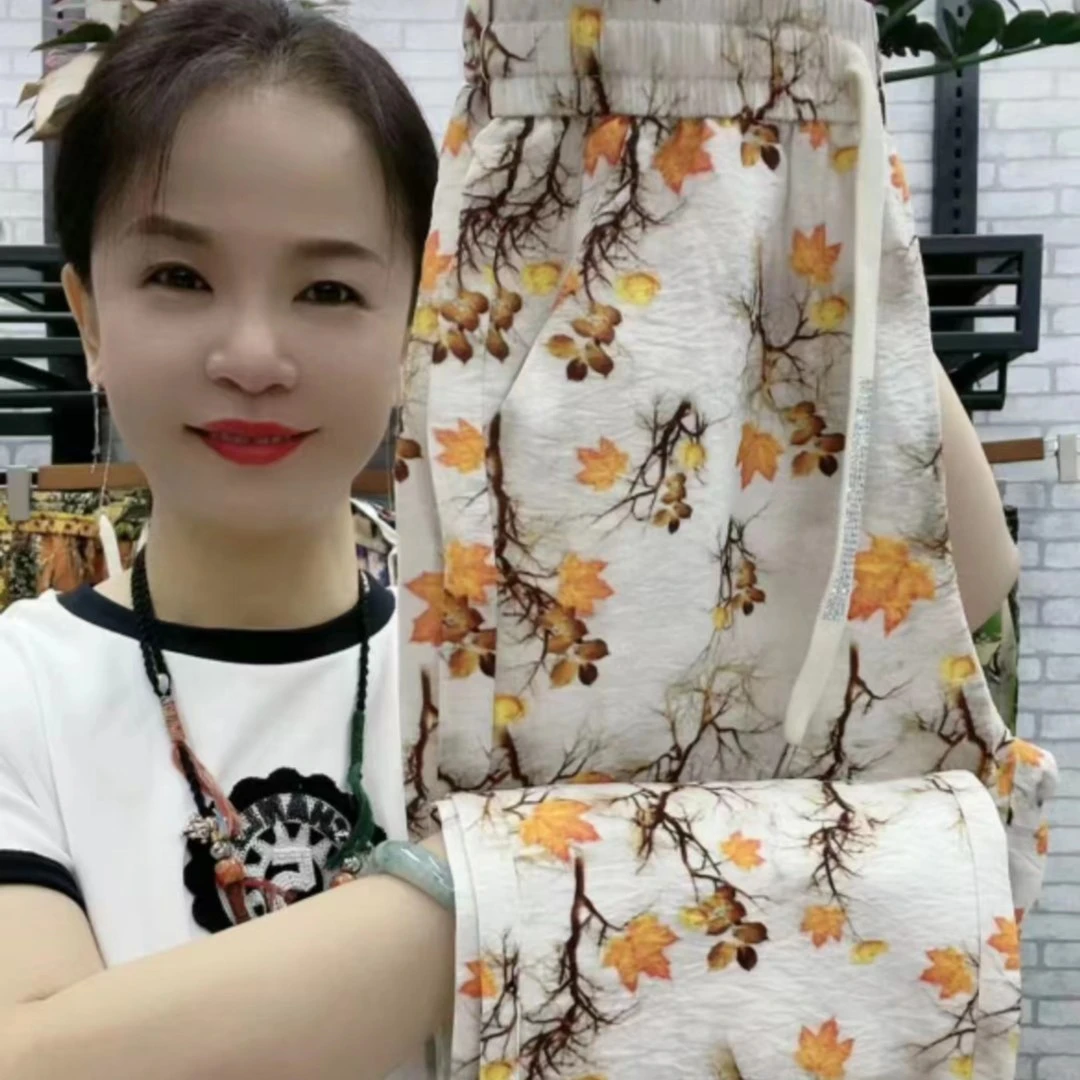女士碎花时尚休闲裤绿色夏季宽松印花薄款花色沙滩裤九分裤