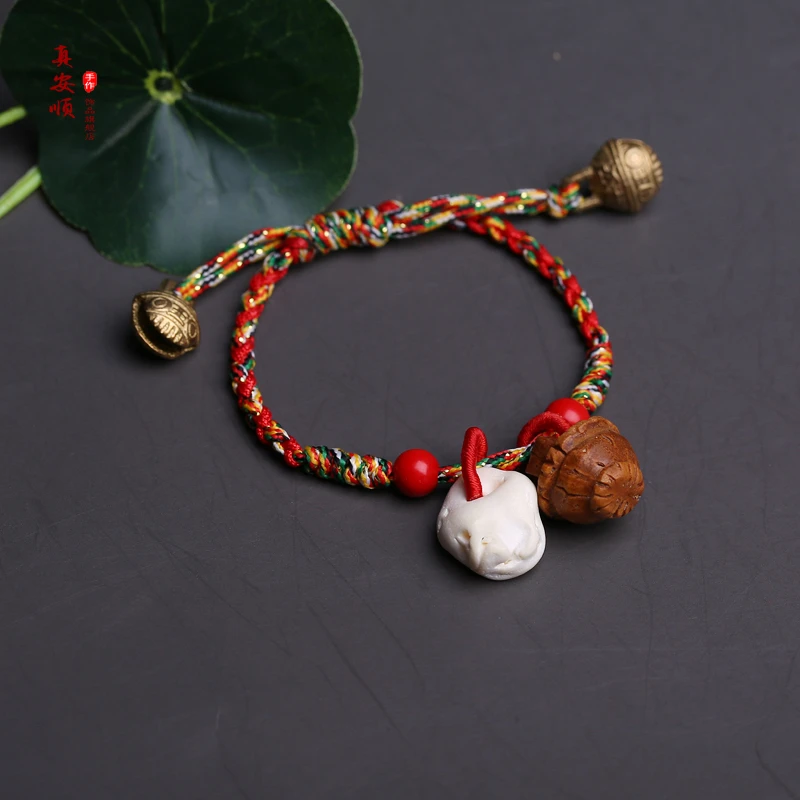 布艺手链 猪精骨桃蓝儿童手链铜铃铛五彩绳成人婴儿同款男女亲子