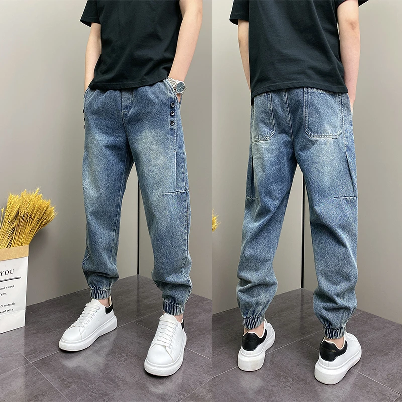 2025年春秋季潮流韩版痞帅束脚水洗磨白宽松哈伦扣子休闲牛仔裤子