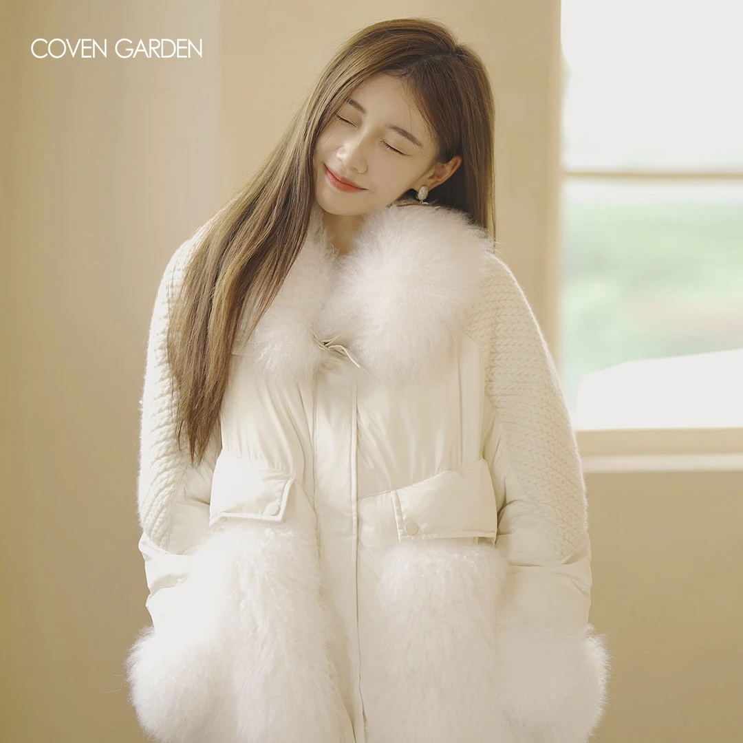 哥文花园 秋冬设计保暖修身显瘦感拼接女羽绒服 CTA4331250