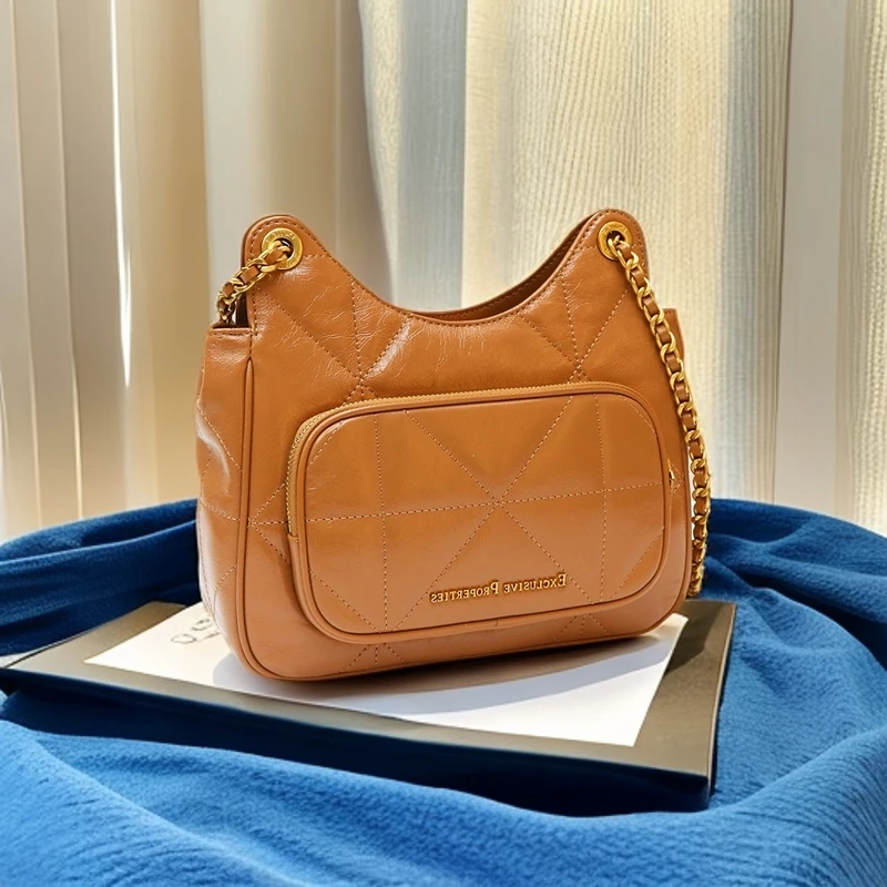 2024新款时尚牛皮单肩斜跨包百搭23C0695