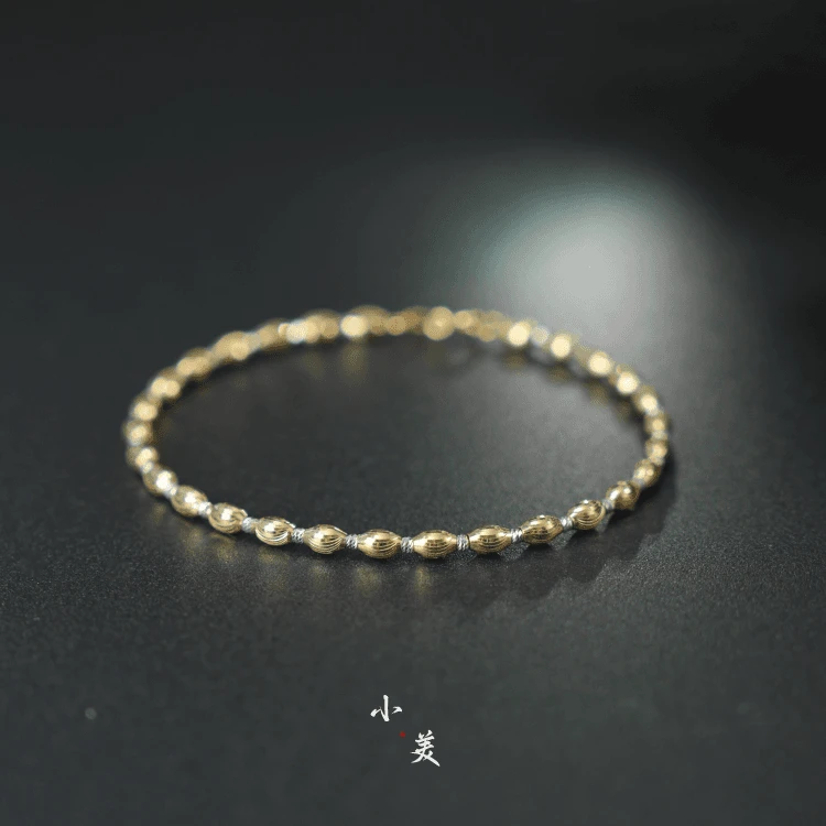 18K金双色车花猫眼手链 G9378