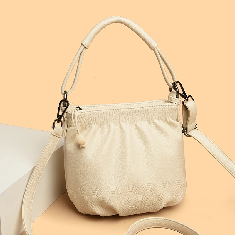 米琦袋鼠中年女士高级感洋气简约手提包2025新款送妈妈时尚斜挎包