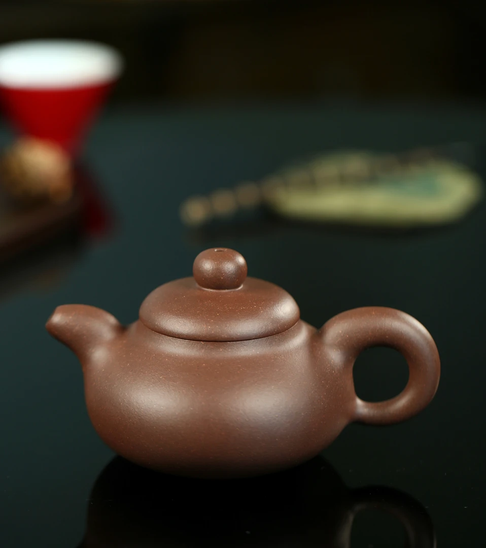 沽泉，容量200cc，选用30目原矿紫青泥全手工制作。紫砂壶