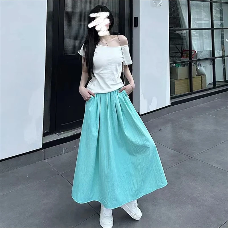 纯色甜美学院风垂感山本半身裙夏新款松紧腰口袋款遮胯显瘦A字裙