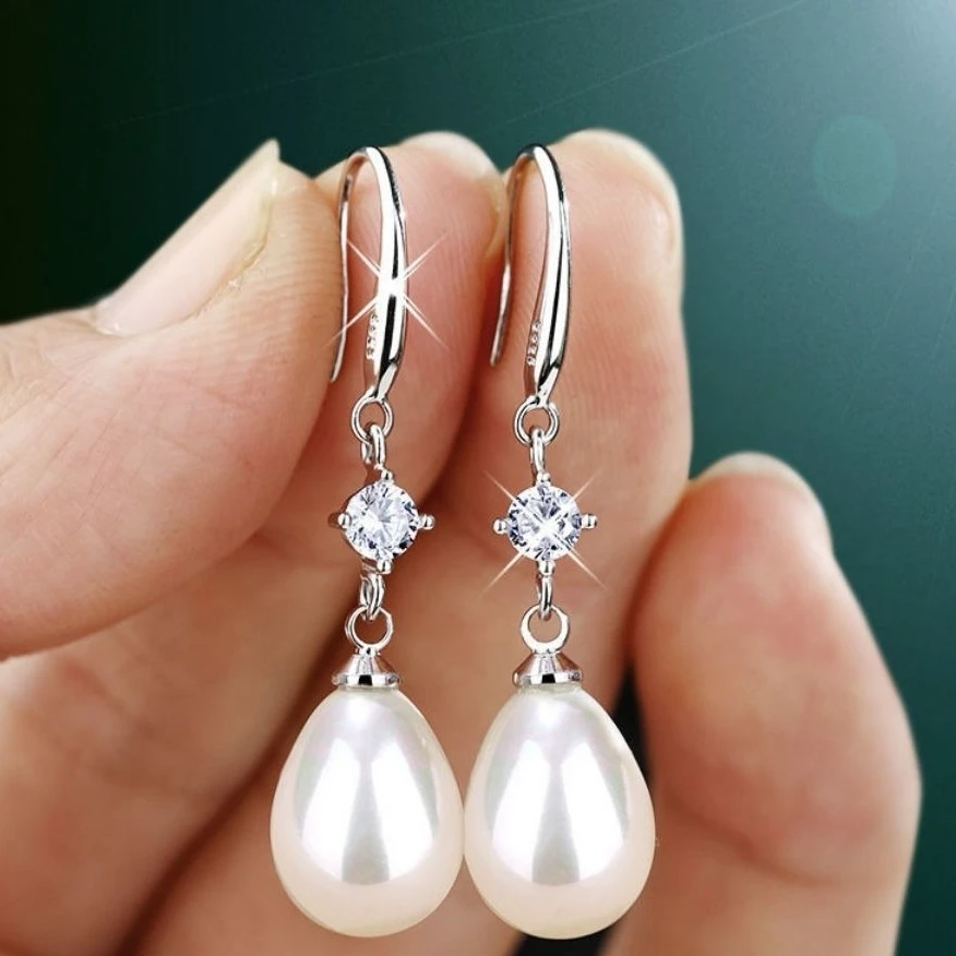 DIY创意白色珠子耳挂2.5四帅pp