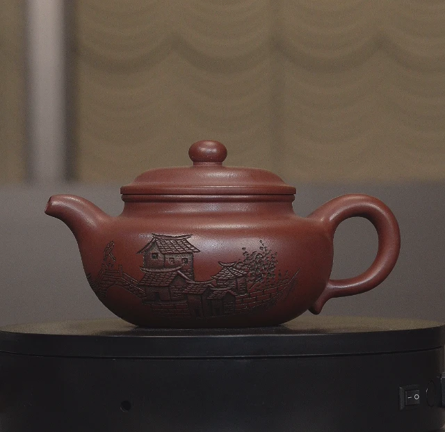 248 龙血砂浮雕刻仿古壶