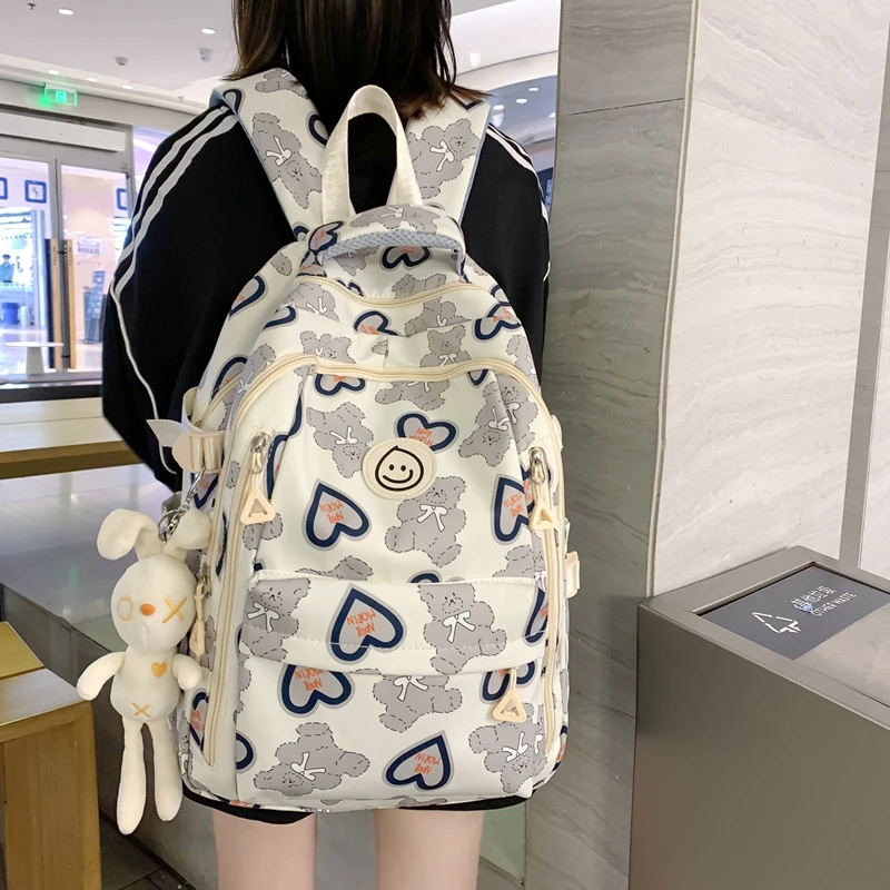 高颜值书包女大学生休闲百搭小学生双肩包初中生高中生大容量背包