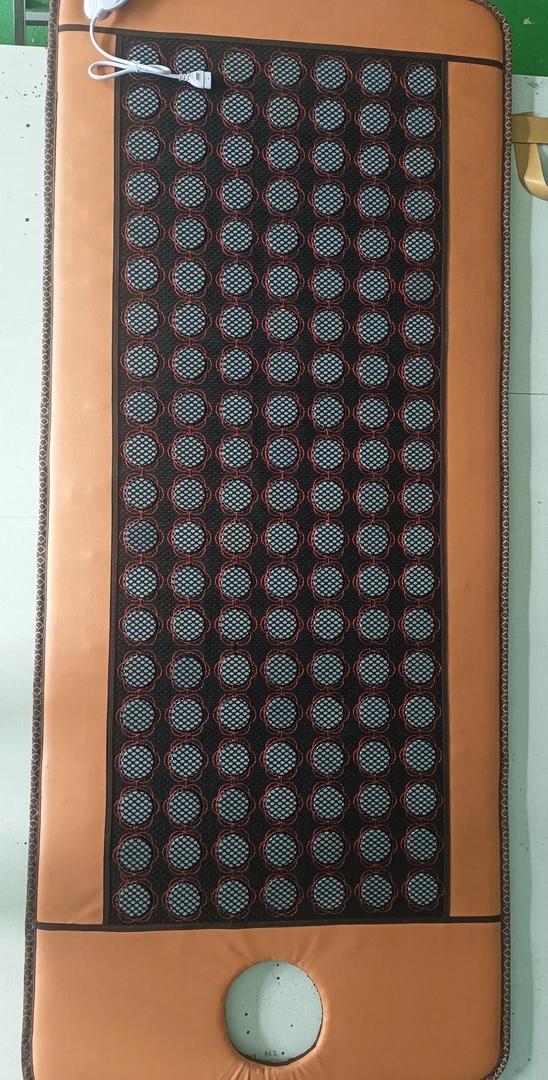 砭石开孔加温床垫