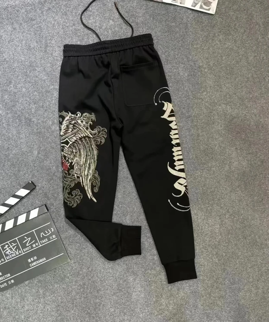 11777秋冬新款潮流字母翅膀满钻轻奢男士休闲时尚卫裤