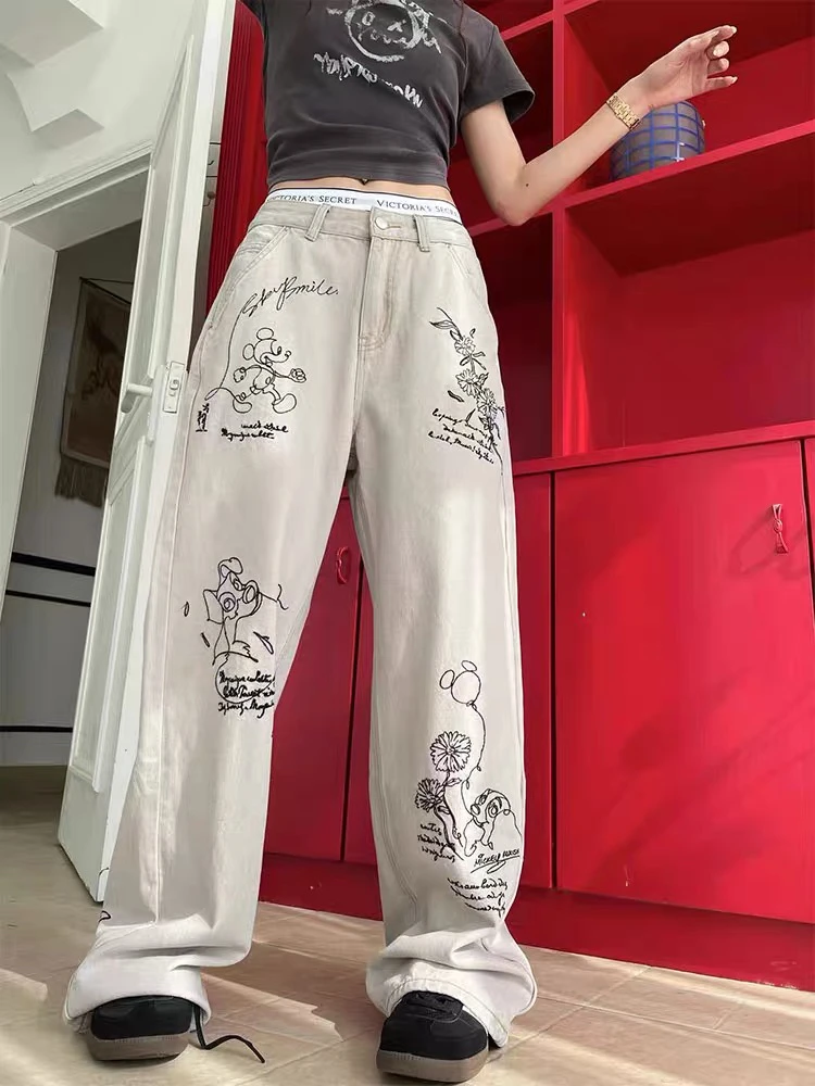 深圳MMOUHUO新品秋款卡通印花牛仔裤