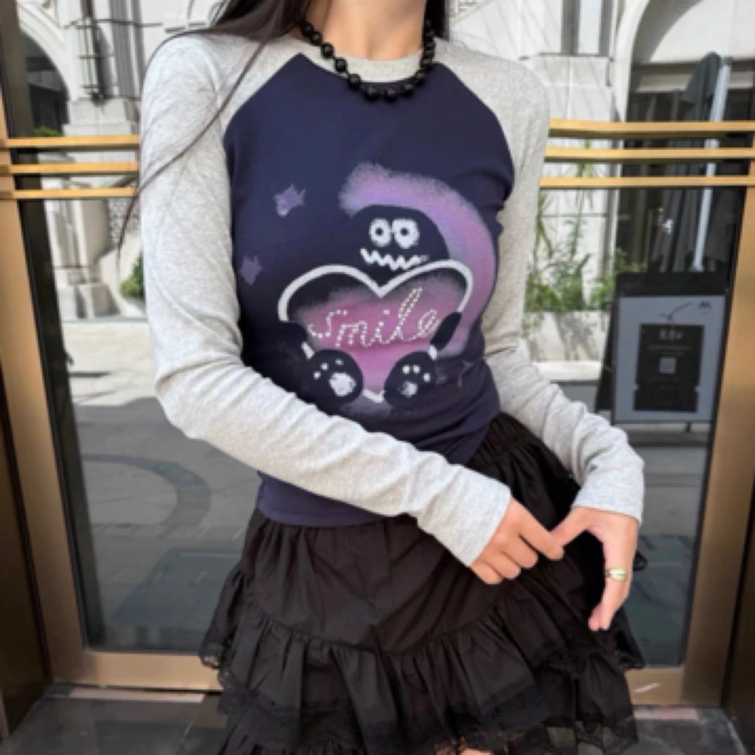 深圳MMOUHUO新款插肩袖爱心字母涂鸦T恤