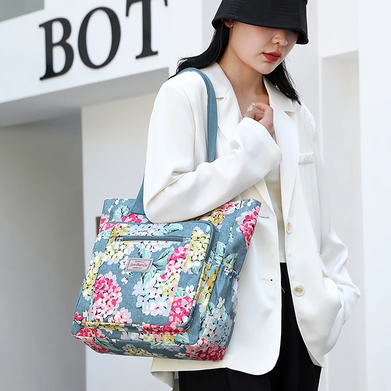 时尚休闲妈咪包印花轻便单肩布包肩包百搭女士多功能便携韩版卡通