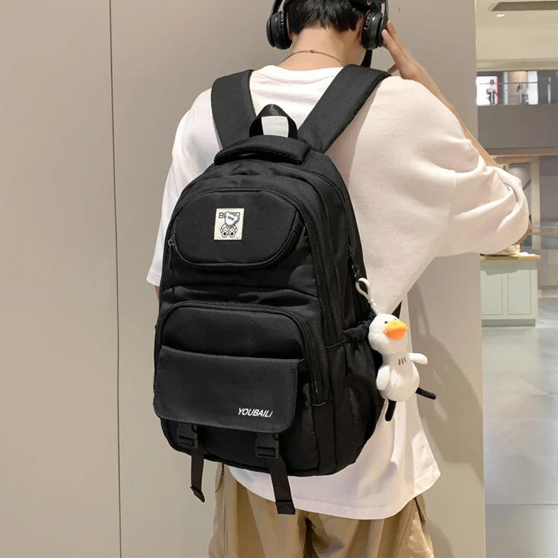 减负护脊四五六年级初中高中生书包女学生百搭大容量双肩包背包男