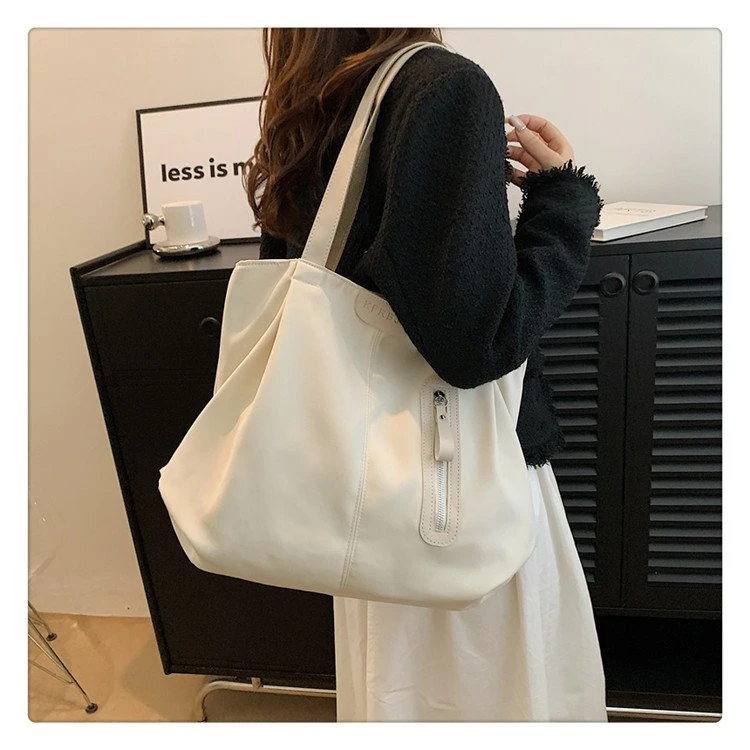 休闲百搭帆布包包女2023新款高级质感大容量简约单肩包通勤托特包