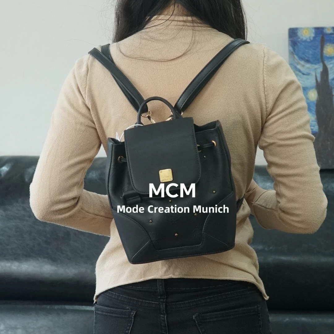 95新 MCM 黑色双肩包/WJ09501028/1028