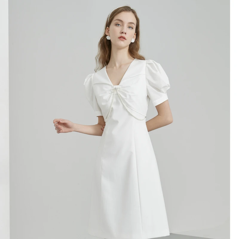 【诗语专属】恩曼琳夏新品珍链条蝴蝶结V领泡泡袖修身连衣裙EANCBA0