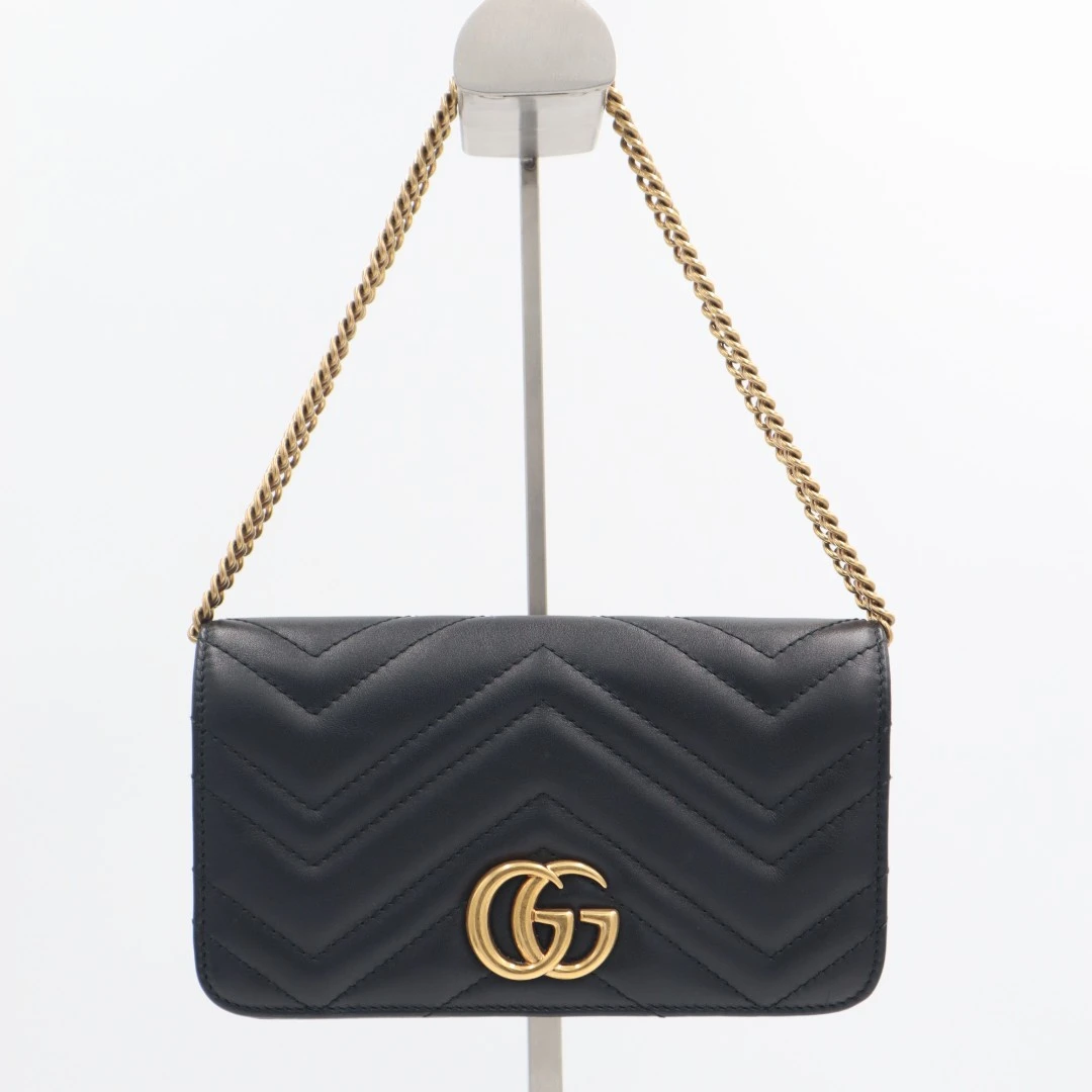 99新 GUCCI/古驰 马蒙黑金woc包/1102025